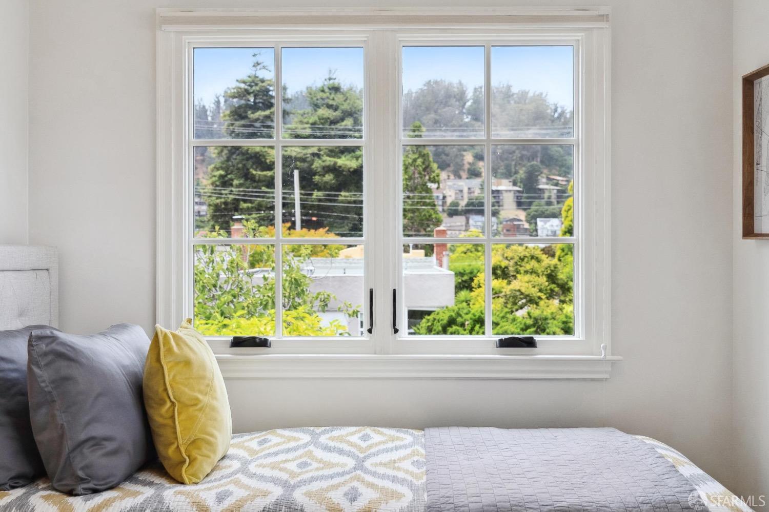 508 Talbot Avenue Albany, CA 94706 - Photo 45 of 66 a bed sitting in a bedroom next to a window