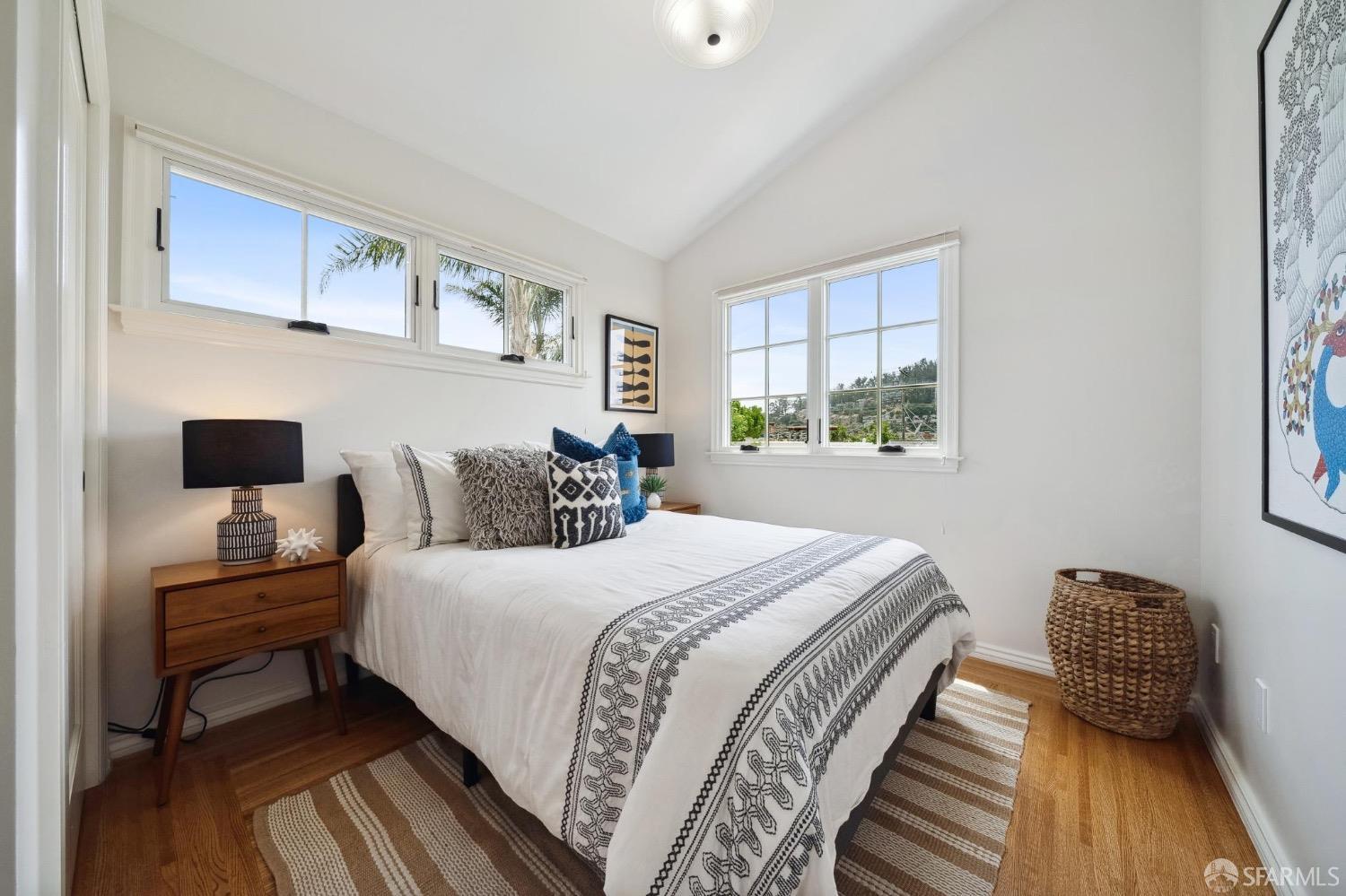 508 Talbot Avenue Albany, CA 94706 - Photo 48 of 66 a bedroom with a bed and wooden floor