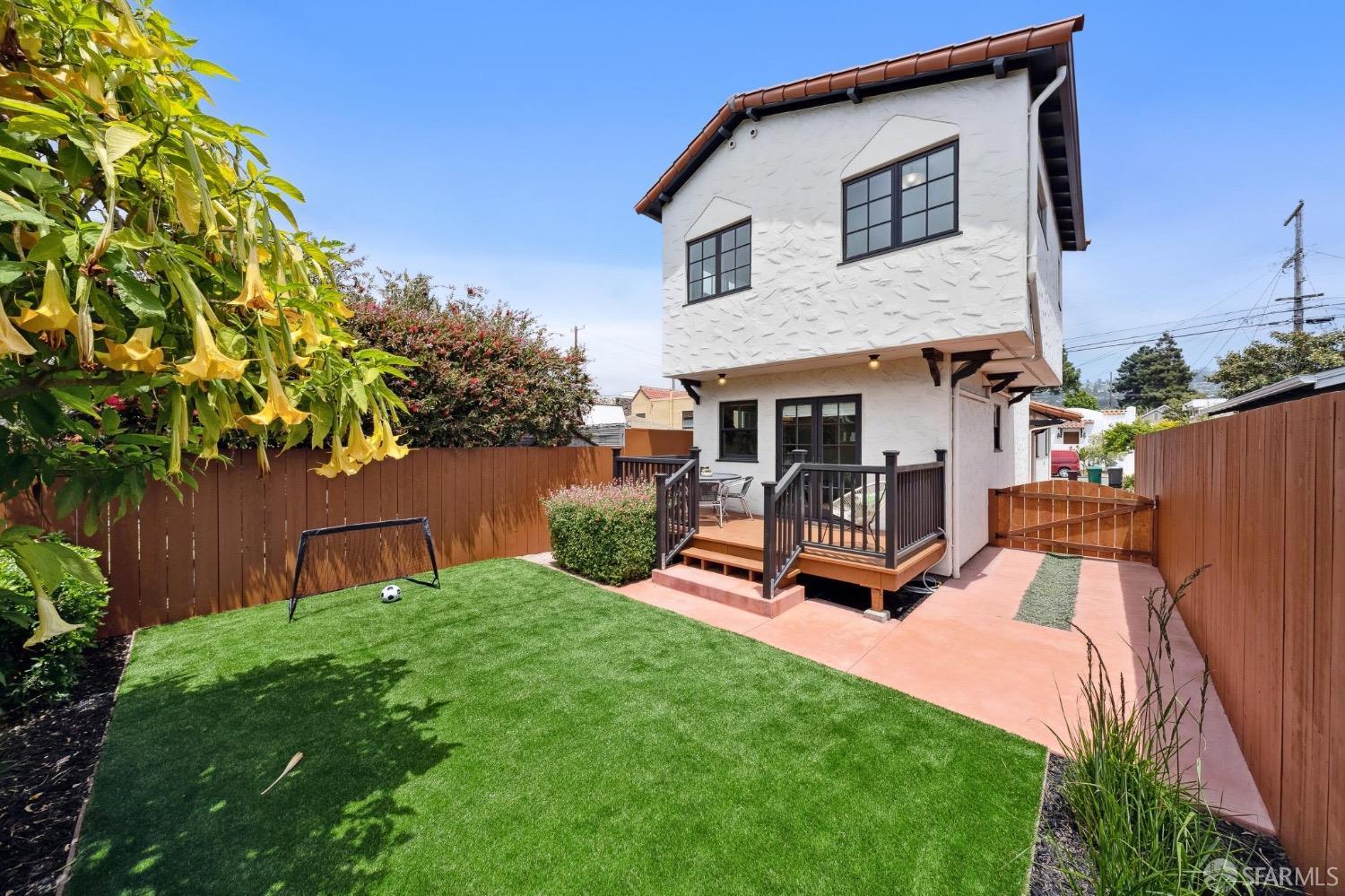 508 Talbot Avenue Albany, CA 94706 - Photo 54 of 66 a white bench sitting in front of a house with a big yard