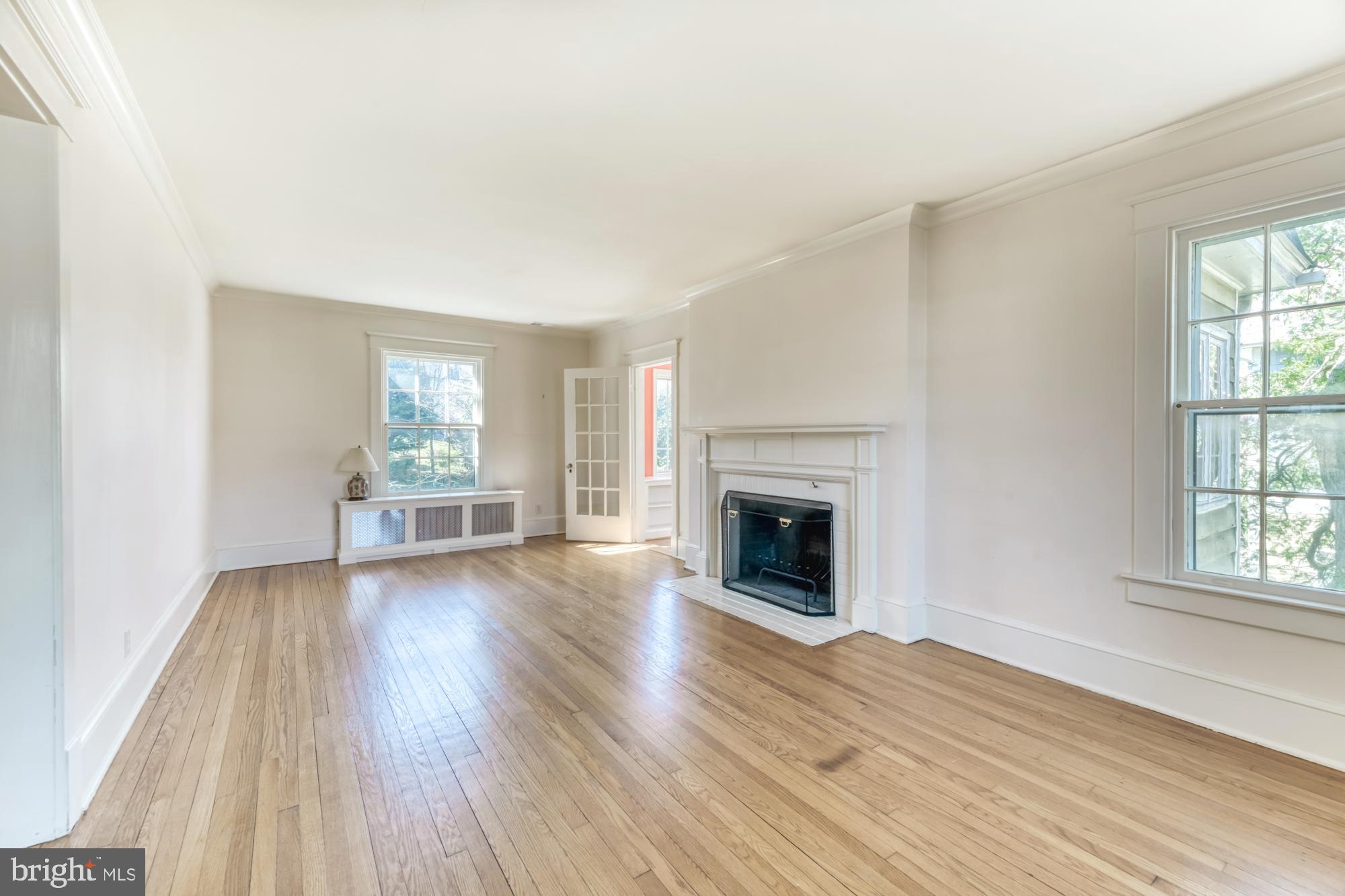 2800 Russell Road Alexandria, VA 22305 - Photo 24 of 48 Living room with fireplace & wood floors