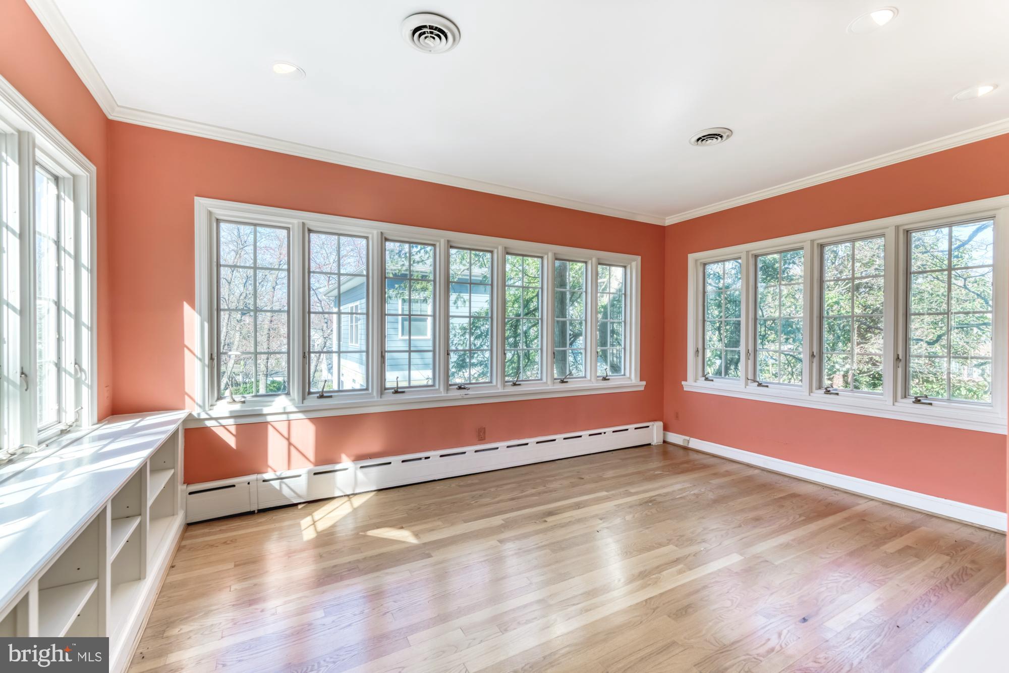 2800 Russell Road Alexandria, VA 22305 - Photo 27 of 48 Sunroom with wood floors and built-ins