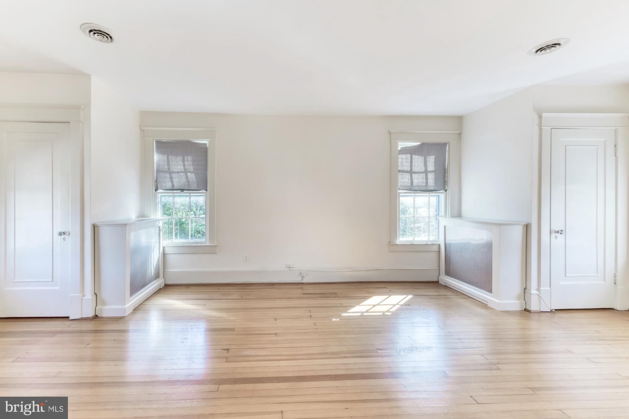 2800 Russell Road Alexandria, VA 22305 - Photo 37 of 48 Primary bedroom w 2 closets & wood floors