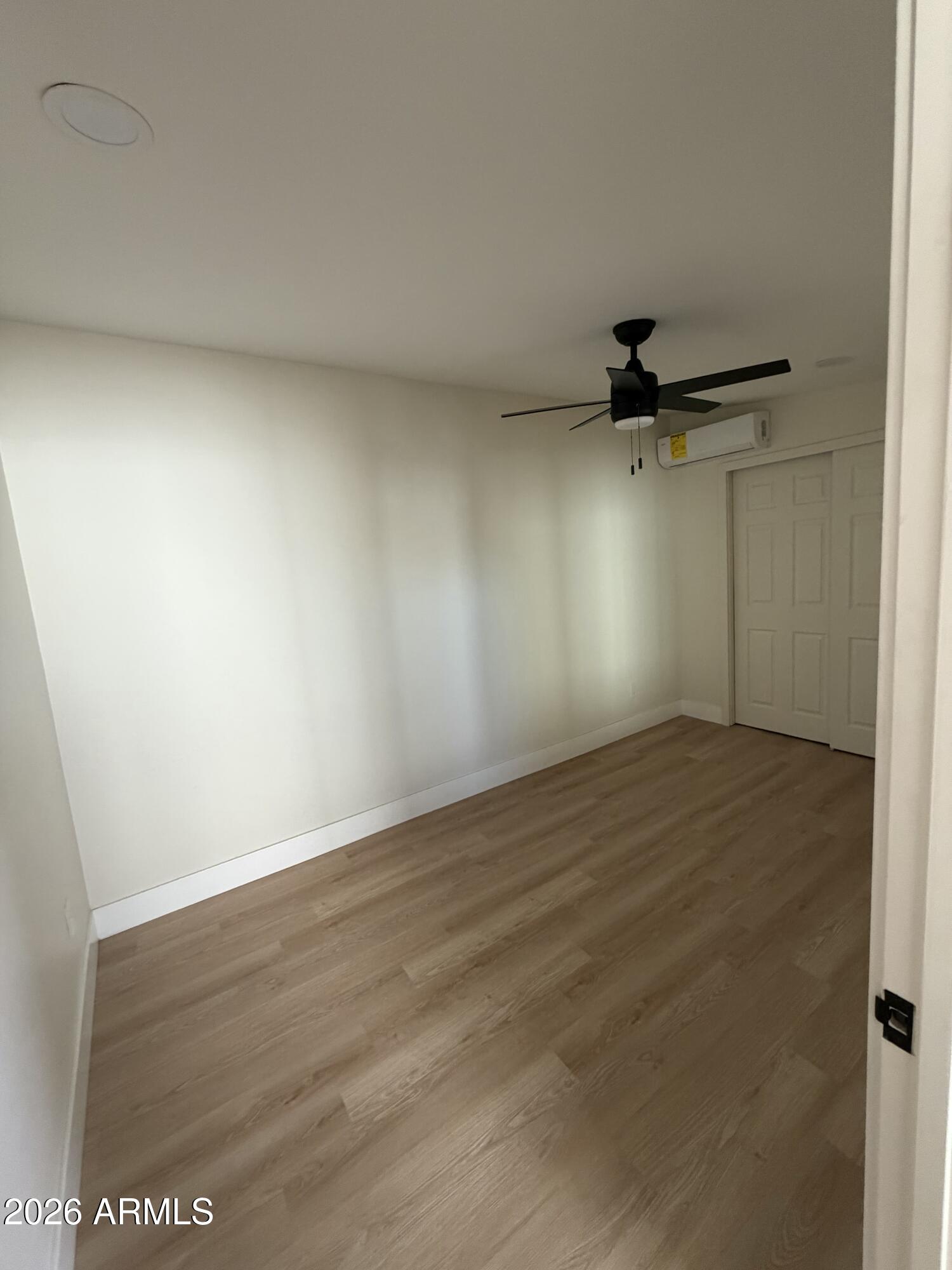 1730 West Thomas Road Phoenix, AZ 85015 - Photo 28 of 38 wooden floor in an empty room