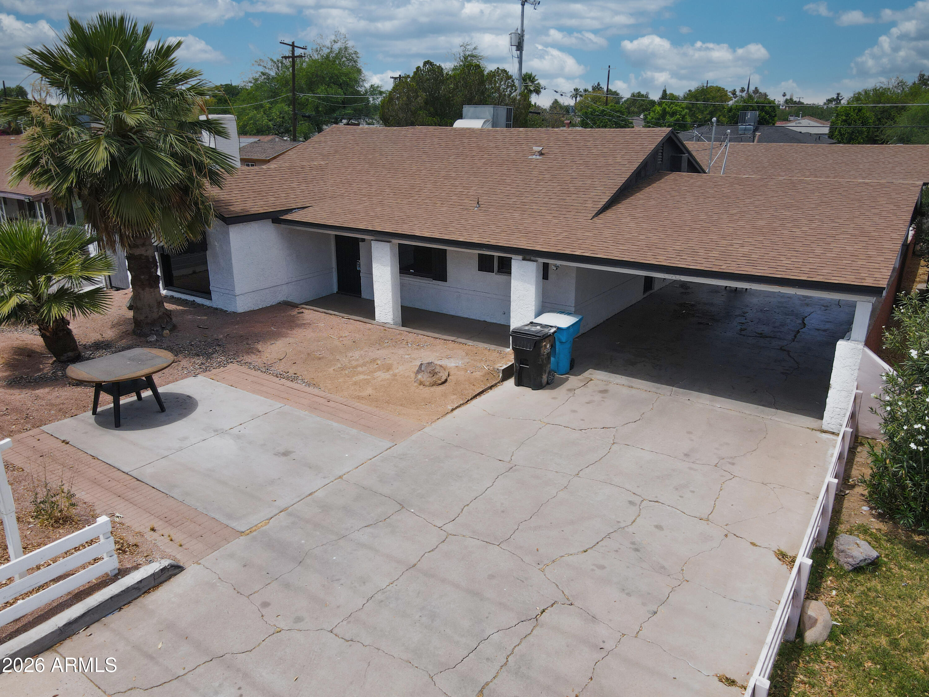 1730 West Thomas Road Phoenix, AZ 85015 - Photo 4 of 38 an aerial view of a house with swimming pool and patio