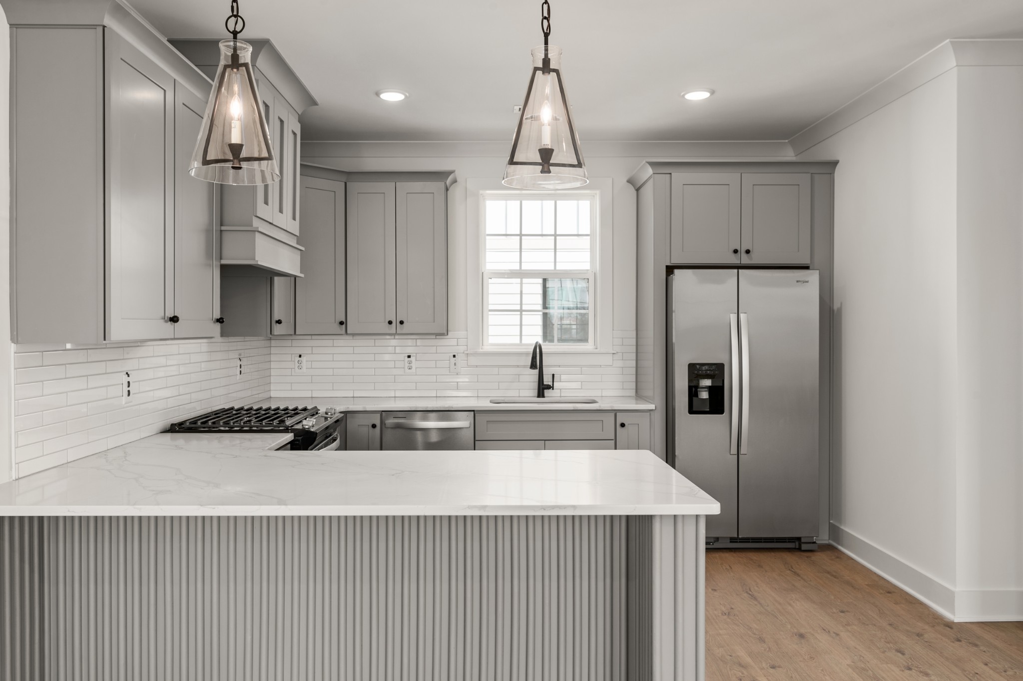 251 Nesbitt Lane Madison, TN 37115 - Photo 3 of 20 a kitchen with stainless steel appliances granite countertop a sink a stove a refrigerator and cabinets