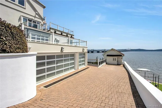 a view of a swimming pool and lounge chair