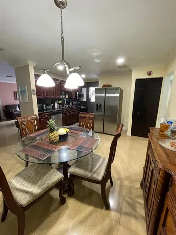 a view of a workspace with furniture