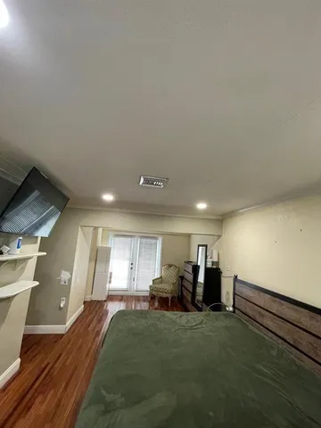 a bathroom with a tub and a shower