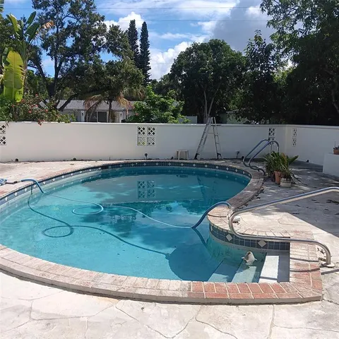 a bathroom with a sink vanity and a mirror
