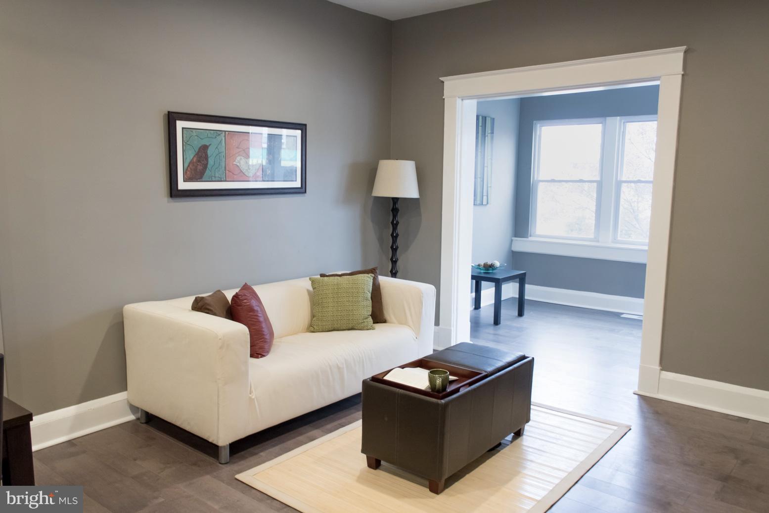 1743 Portship Road Baltimore, MD 21222 - Photo 2 of 30 a living room with furniture and a window