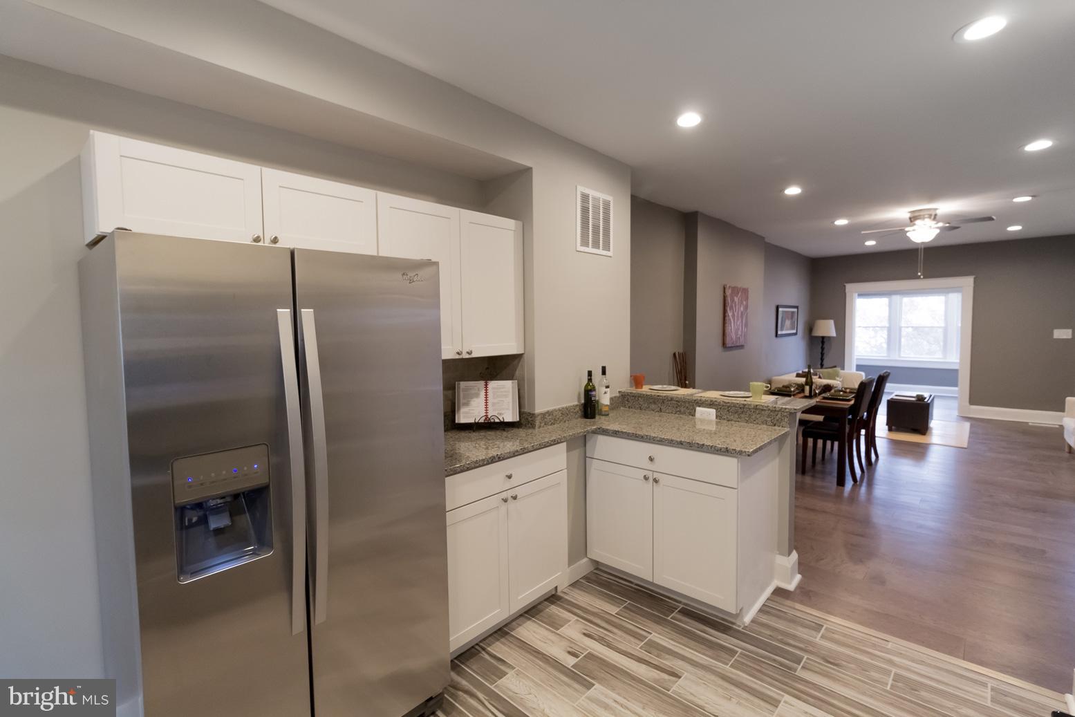1743 Portship Road Baltimore, MD 21222 - Photo 13 of 30 a kitchen with a sink stainless steel appliances and cabinets