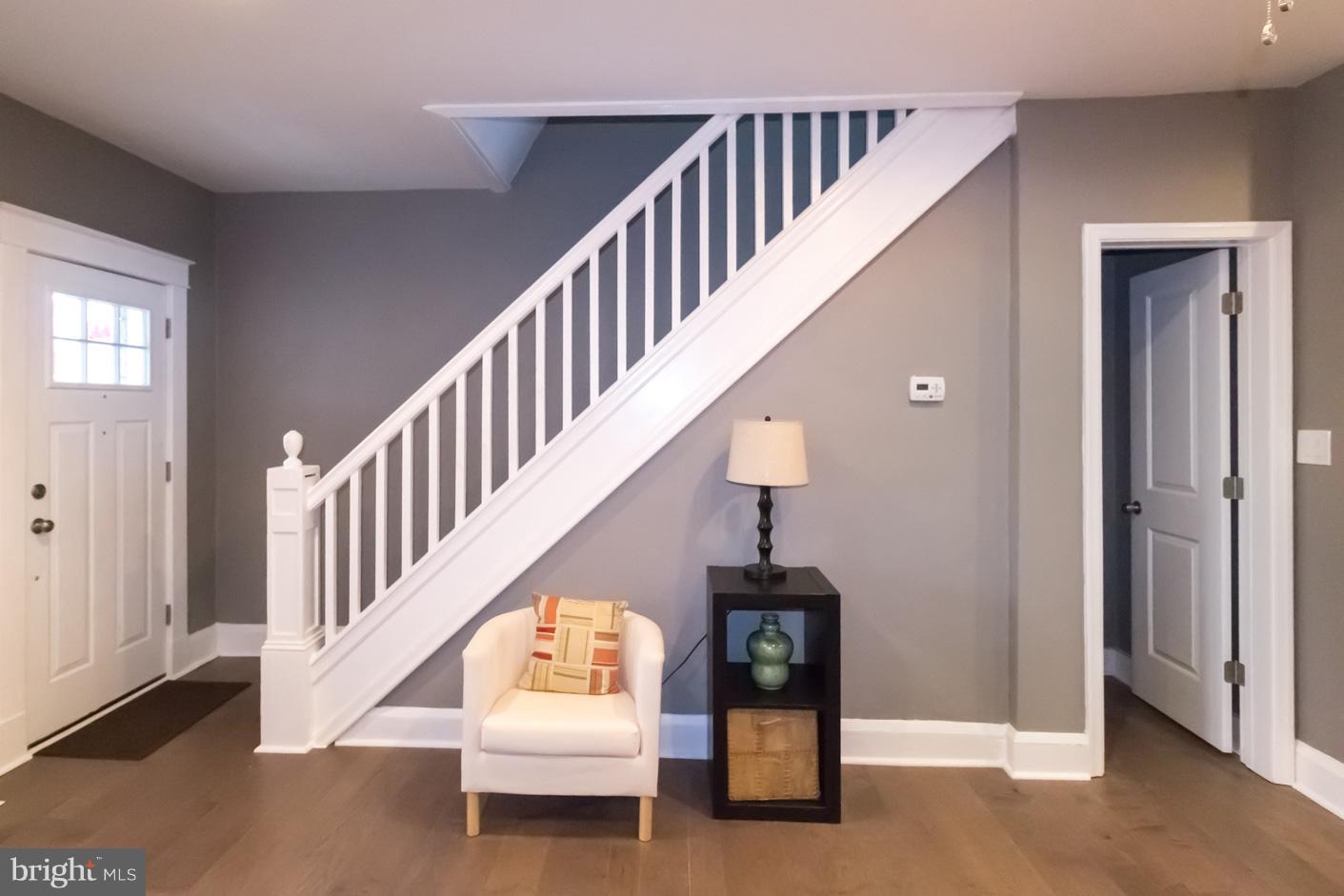 1743 Portship Road Baltimore, MD 21222 - Photo 3 of 30 a view of entryway and hall with wooden floor