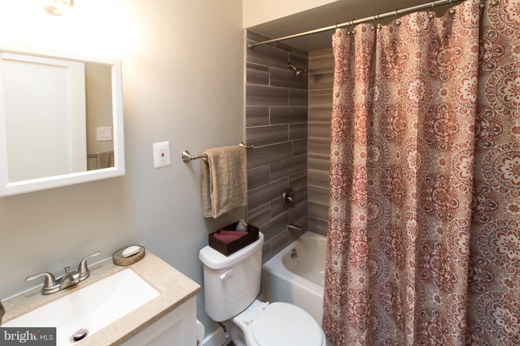1743 Portship Road Baltimore, MD 21222 - Photo 23 of 30 a bathroom with a sink and toilet