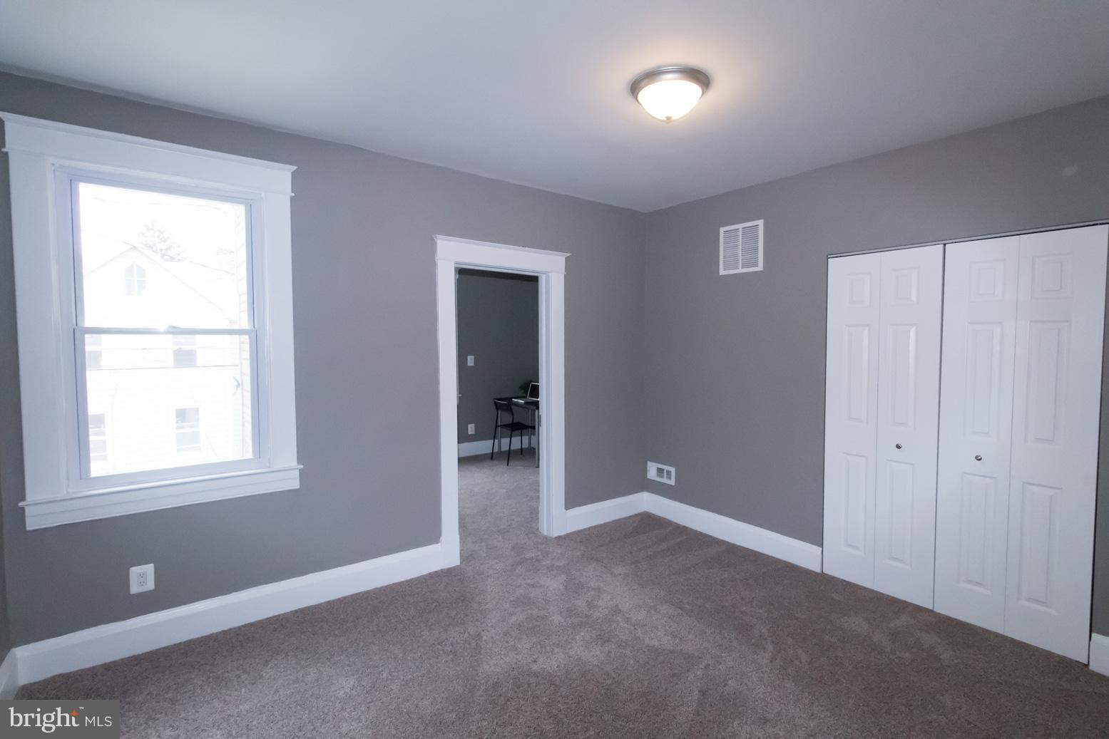 1743 Portship Road Baltimore, MD 21222 - Photo 25 of 30 a view of an empty room with a window