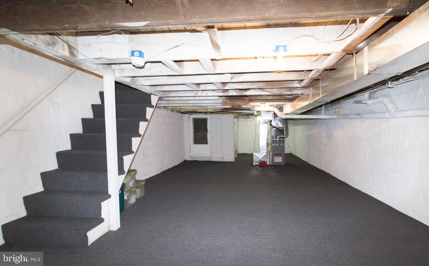 1743 Portship Road Baltimore, MD 21222 - Photo 28 of 30 a view of an empty room with stairs