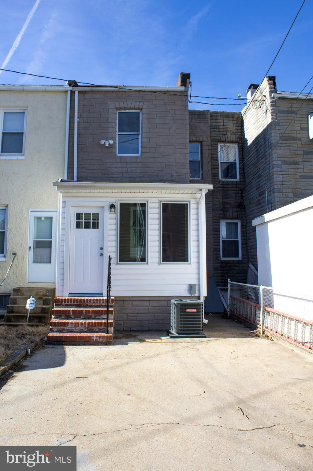 1743 Portship Road Baltimore, MD 21222 - Photo 29 of 30 a front view of a house with a yard