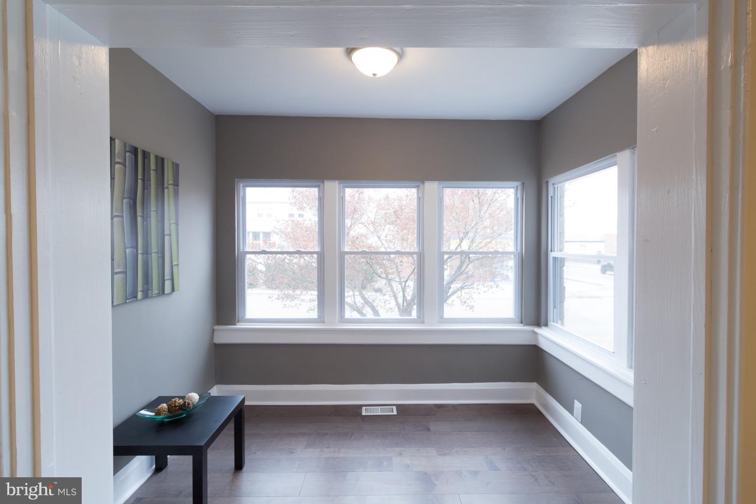 1743 Portship Road Baltimore, MD 21222 - Photo 5 of 30 a view of an empty room with a window