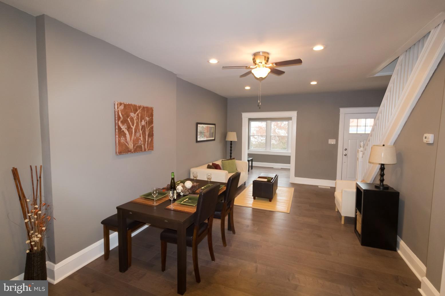 1743 Portship Road Baltimore, MD 21222 - Photo 9 of 30 a view of a dining room with furniture and wooden floor