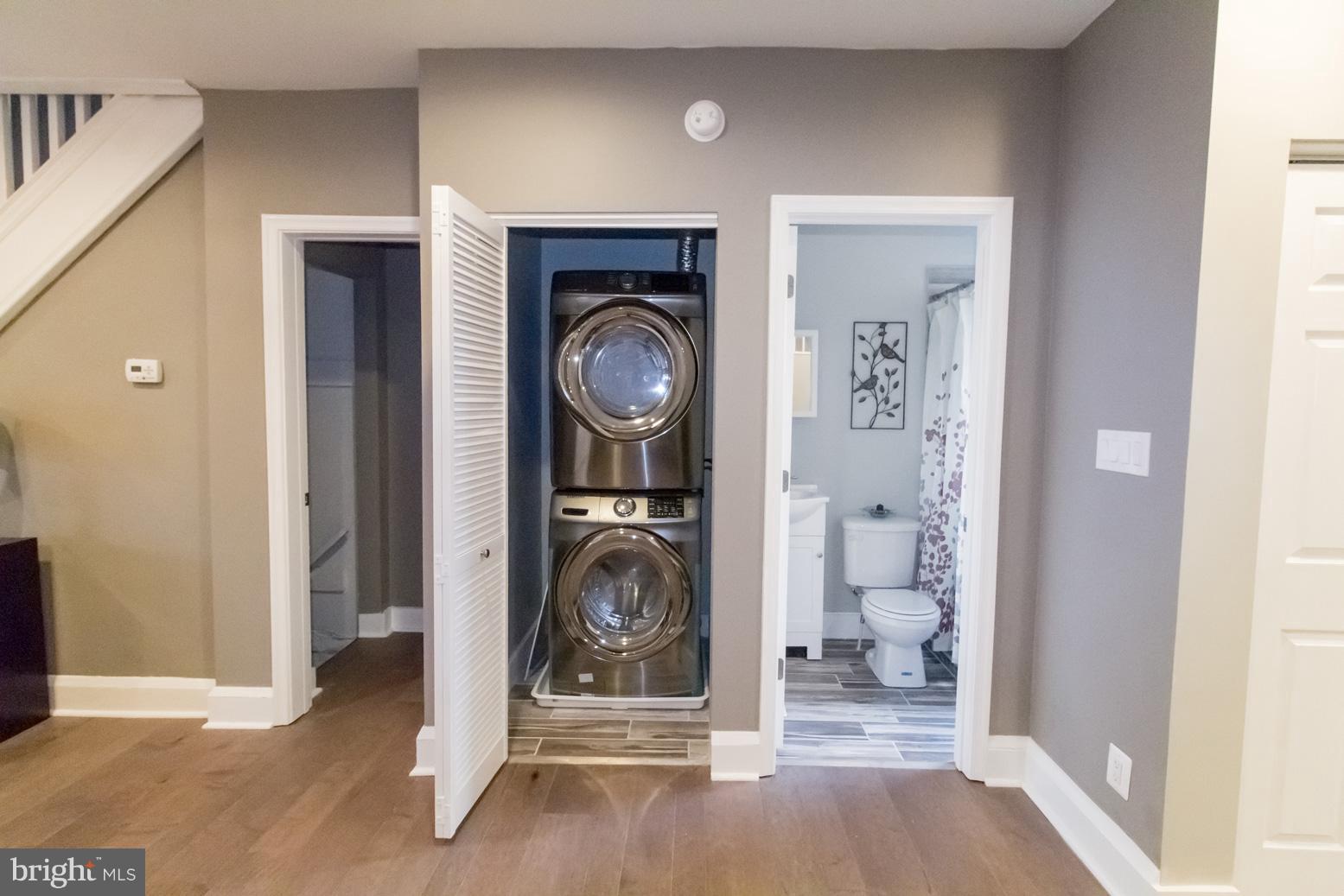 1743 Portship Road Baltimore, MD 21222 - Photo 10 of 30 a view of a hallway with a washer and dryer