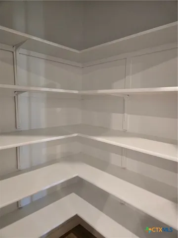 a view of a room with rack on the wall