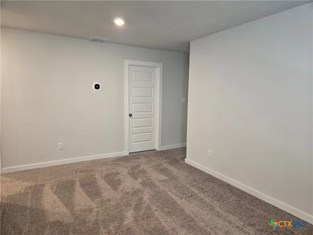 an empty room with closet
