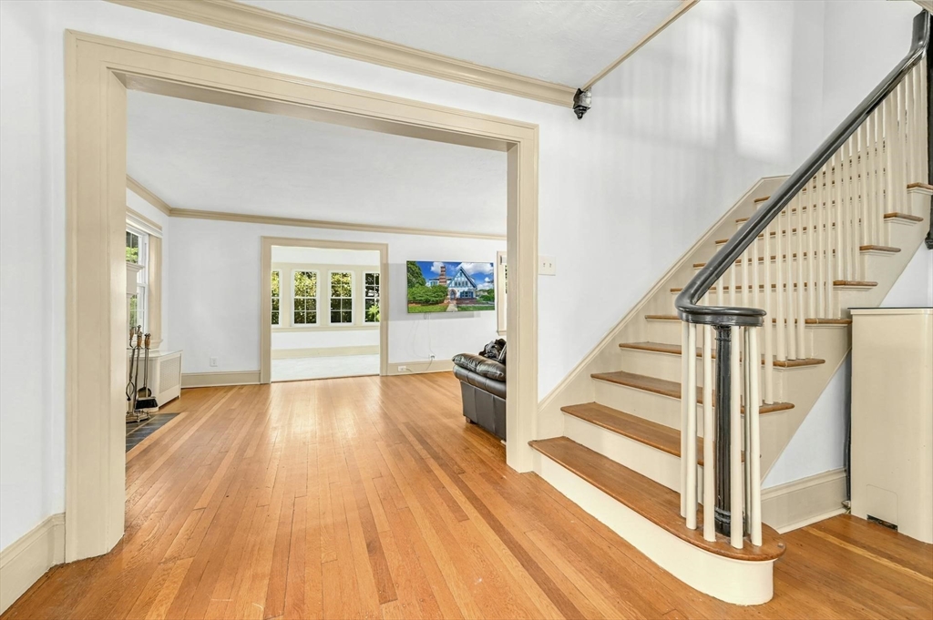 41 Flagg Street Worcester, MA 01602 - Photo 19 of 31 a view of front door with wooden floor and stairs
