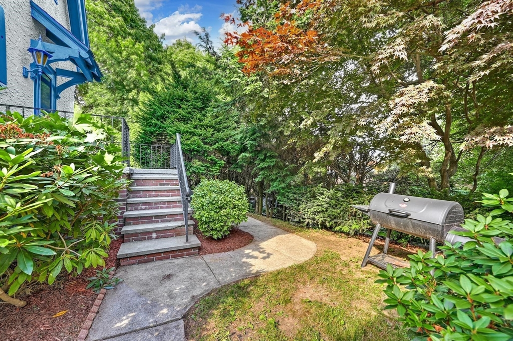 41 Flagg Street Worcester, MA 01602 - Photo 29 of 31 a view of a backyard with chairs
