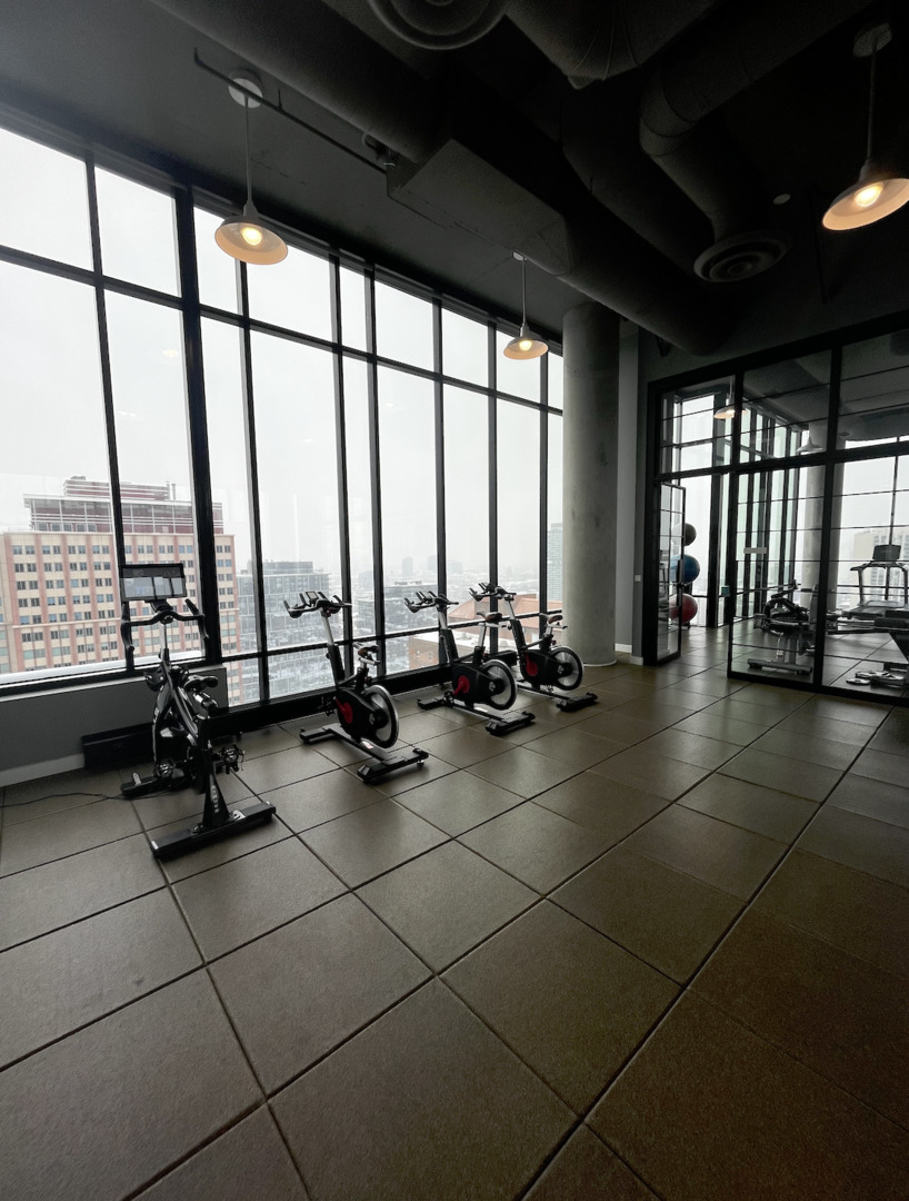 833 North Clark Street, Unit 2408 Chicago, IL 60610 - Photo 15 of 21 a view of a lobby with a floor to ceiling windows and pool table