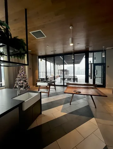 a dinning table and chairs in a patio