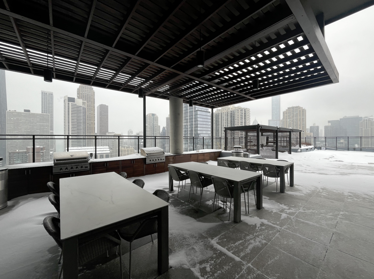 833 North Clark Street, Unit 2408 Chicago, IL 60610 - Photo 19 of 21 a dinning table and chairs in a patio