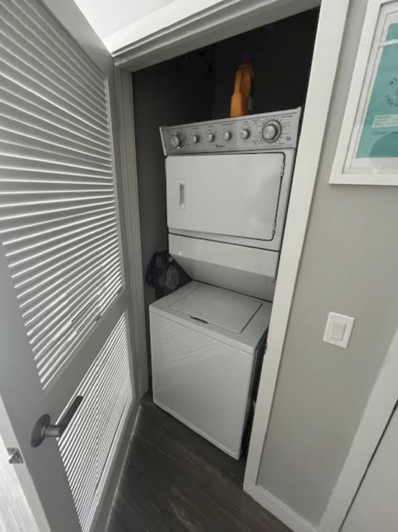 833 North Clark Street, Unit 2408 Chicago, IL 60610 - Photo 7 of 21 a utility room with dryer and washer