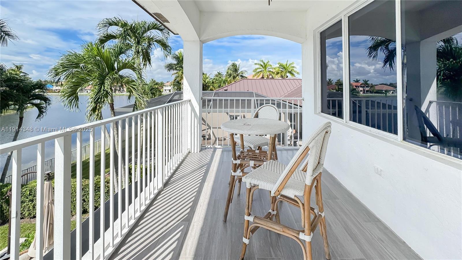 19250 Southwest 30th Street, Unit 50 Miramar, FL 33029 - Photo 20 of 61 a view of a balcony with furniture