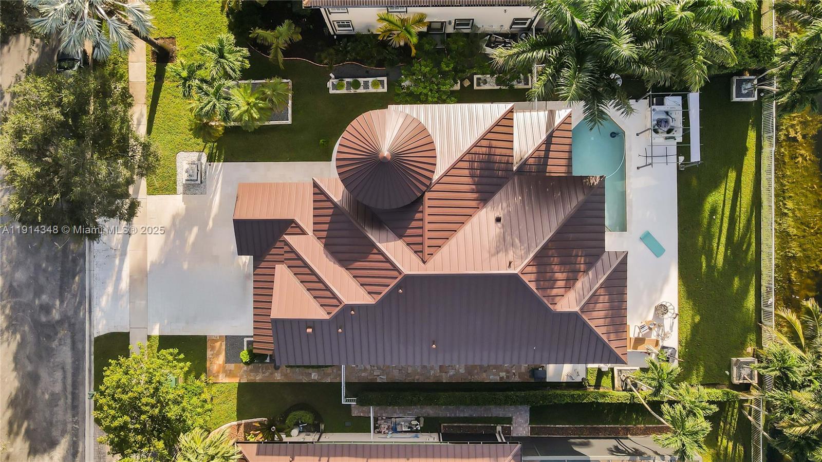 19250 Southwest 30th Street, Unit 50 Miramar, FL 33029 - Photo 8 of 61 a view of a patio with table and chairs and potted plants