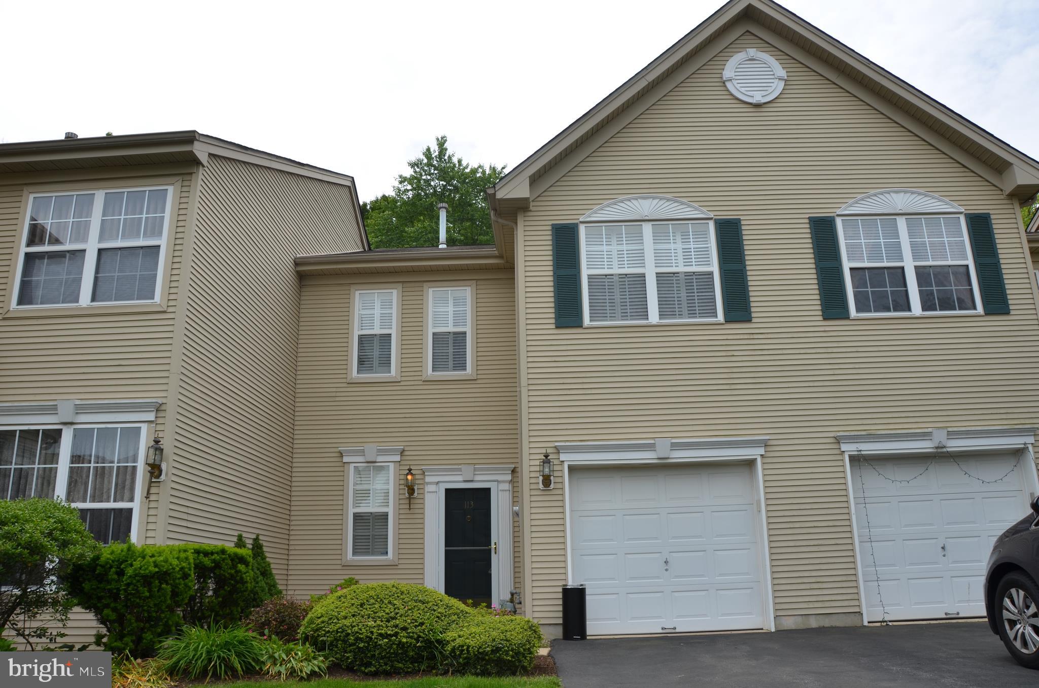 113 Warwick Road Princeton Junction, NJ 08550 - Photo 1 of 31 a front view of a house with parking