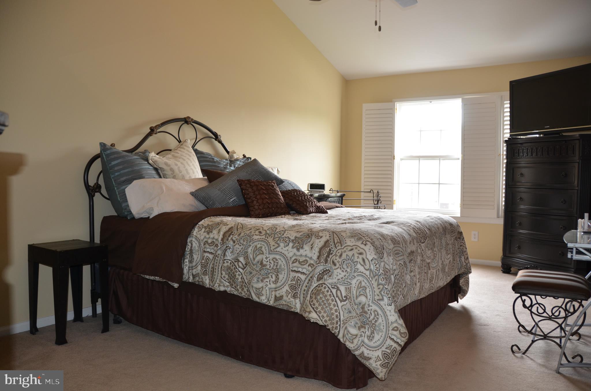 113 Warwick Road Princeton Junction, NJ 08550 - Photo 14 of 31 a bedroom with a bed and wooden floor
