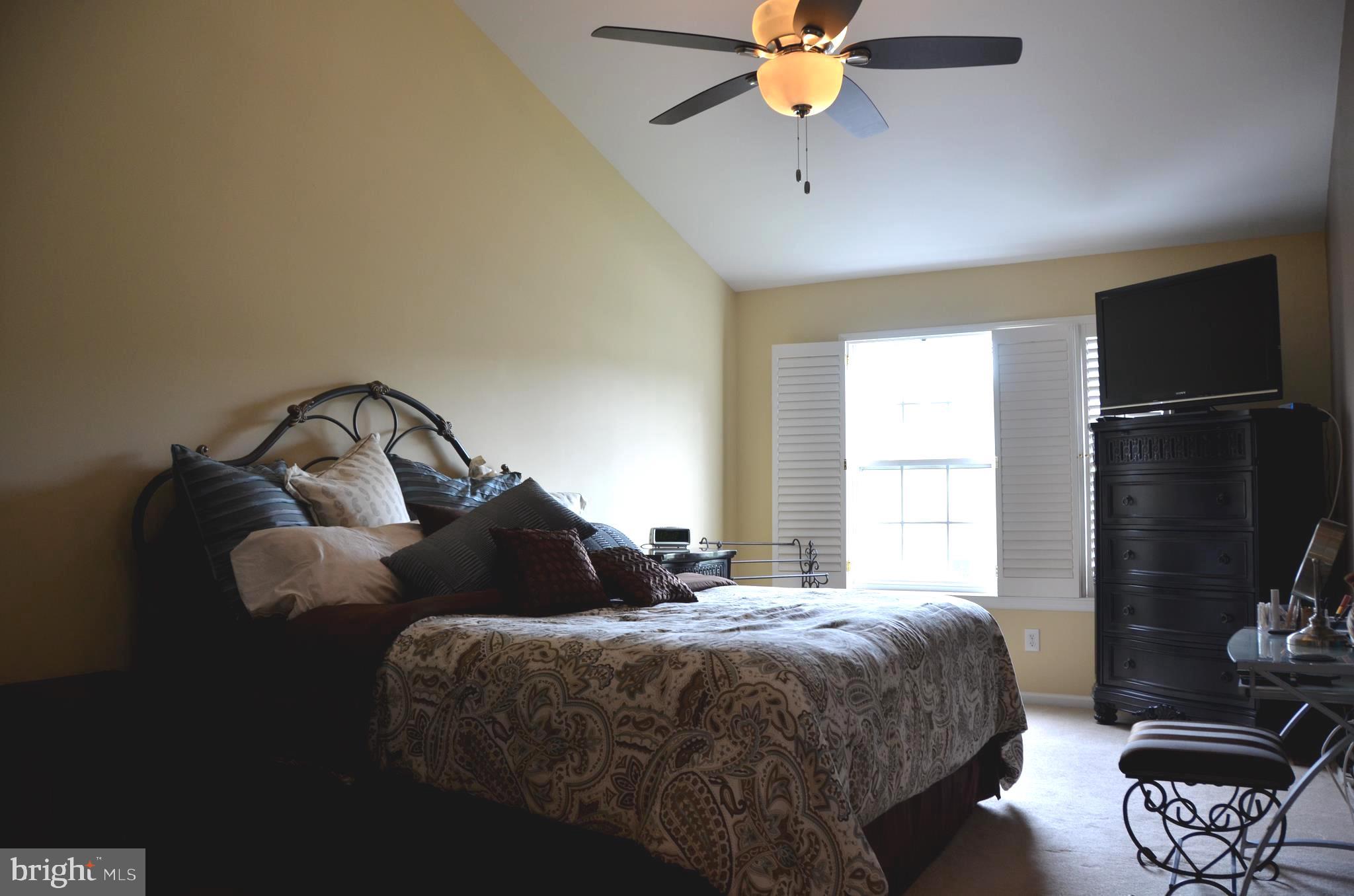 113 Warwick Road Princeton Junction, NJ 08550 - Photo 16 of 31 a bedroom with a bed window and a ceiling fan