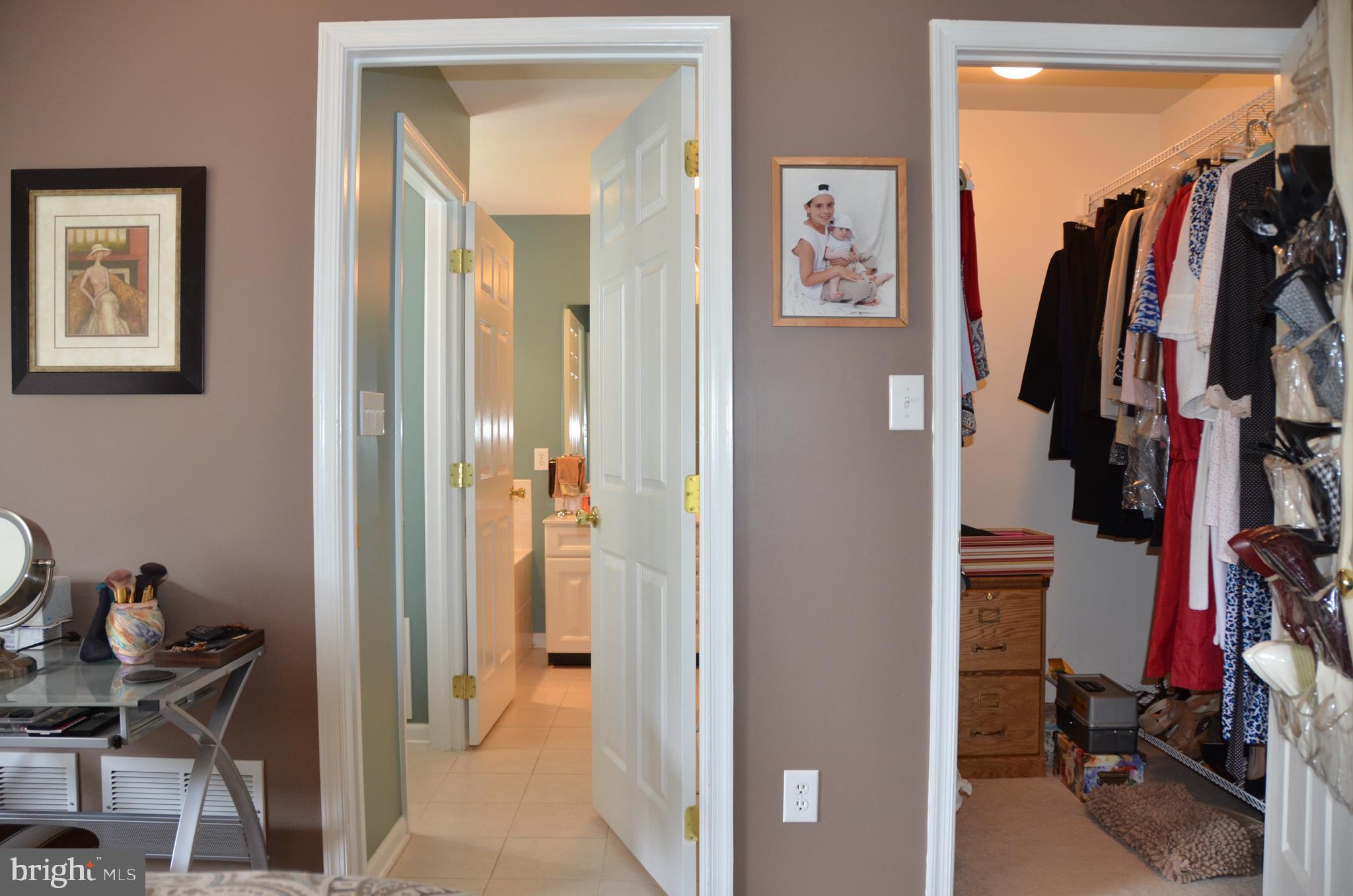 113 Warwick Road Princeton Junction, NJ 08550 - Photo 17 of 31 a view of walk in closet with clothes and shoes