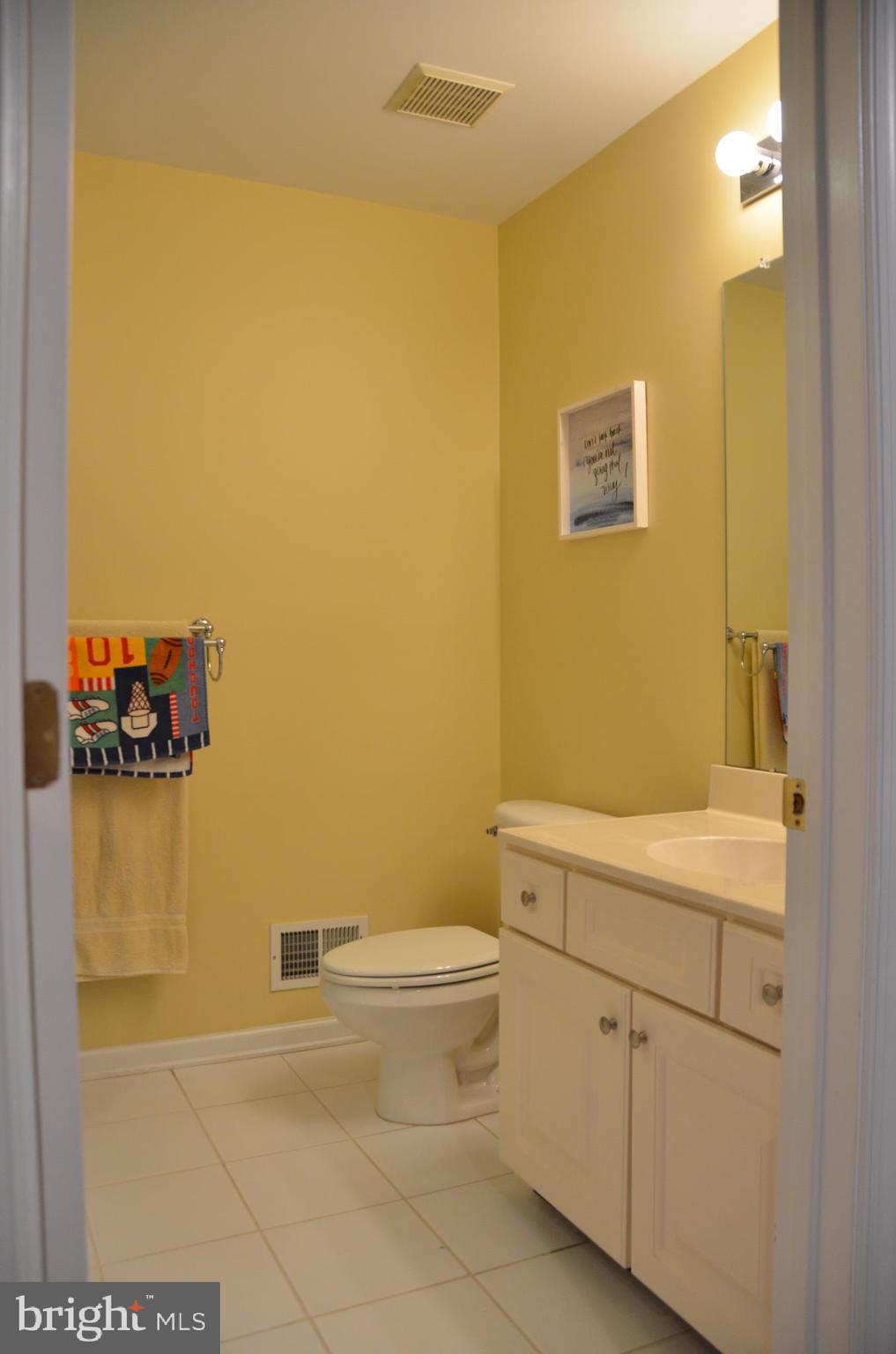 113 Warwick Road Princeton Junction, NJ 08550 - Photo 21 of 31 a bathroom with a toilet sink and mirror