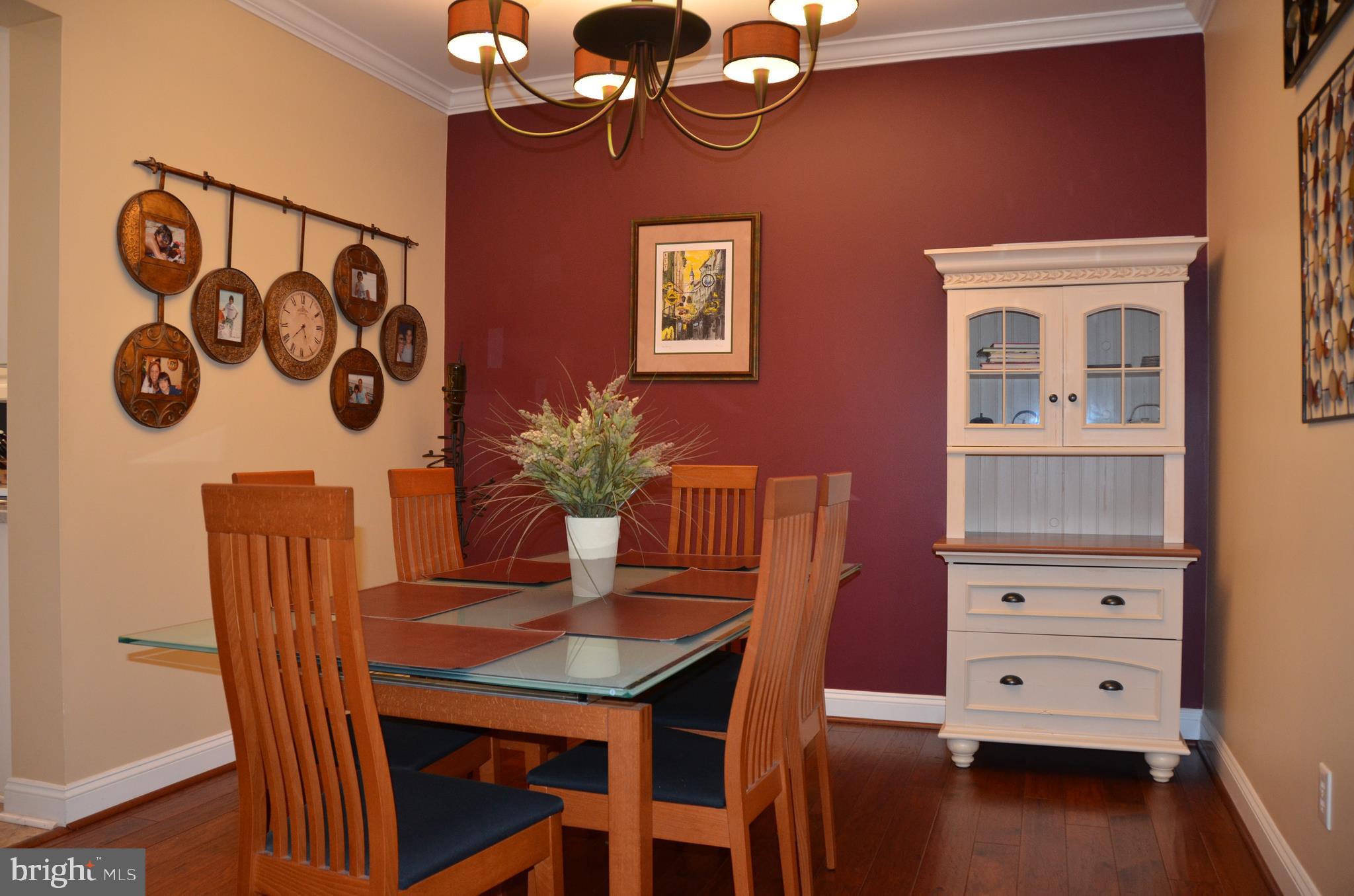 113 Warwick Road Princeton Junction, NJ 08550 - Photo 5 of 31 a dining room with furniture and wooden floor
