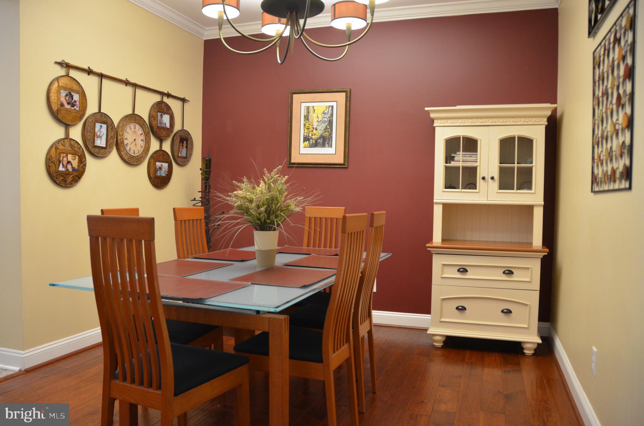 113 Warwick Road Princeton Junction, NJ 08550 - Photo 7 of 31 a dining room with furniture and wooden floor