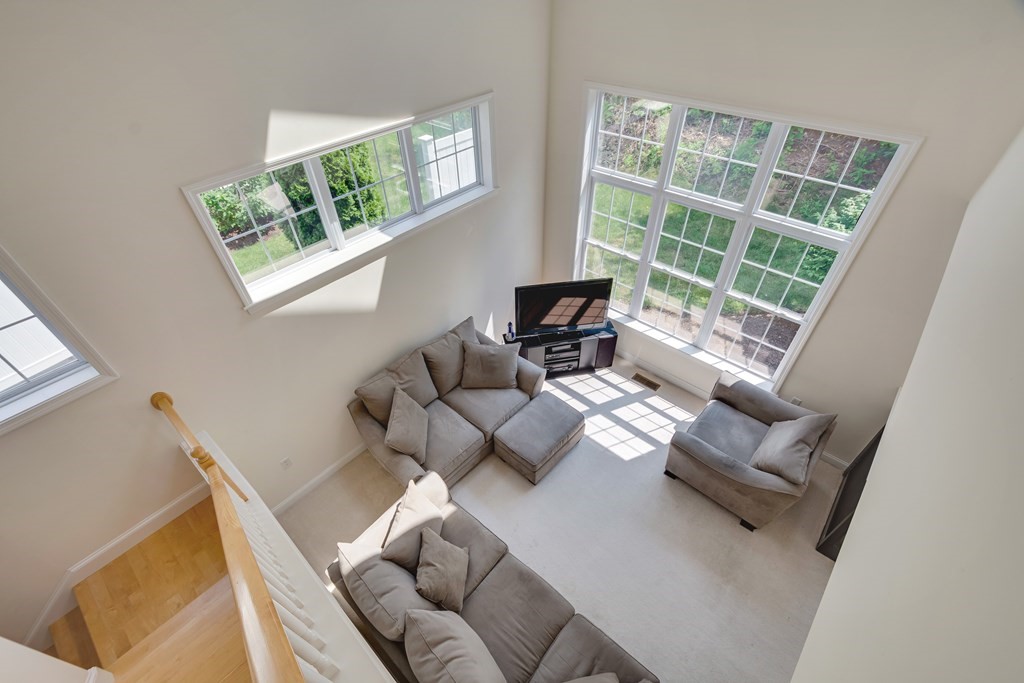508 Linwood Court, Unit 508 Clinton, MA 01510 - Photo 18 of 28 a living room with furniture and a window