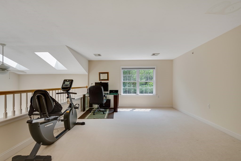 508 Linwood Court, Unit 508 Clinton, MA 01510 - Photo 26 of 28 a view of a room with gym equipment