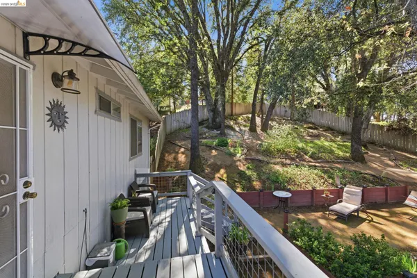 a view of a house with a tree