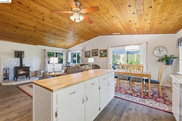 a view of a living room and dining room