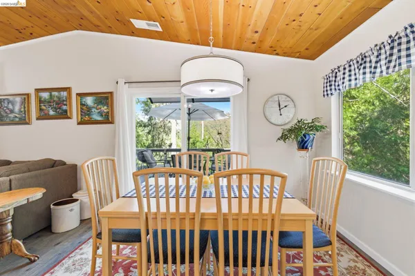 a view of a two chairs in the porch