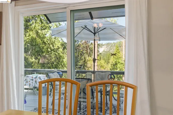 a view of a large window with a yard