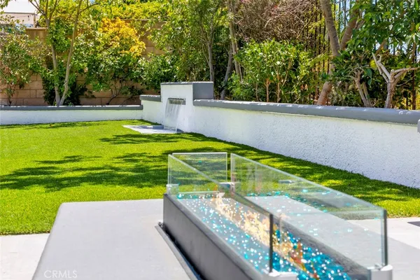 a view of swimming pool with a yard