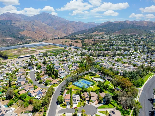 a view of a city with mountains in the background