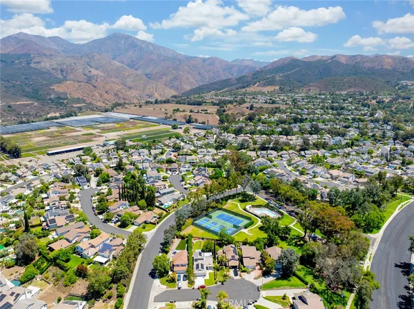 a view of a city with mountains in the background