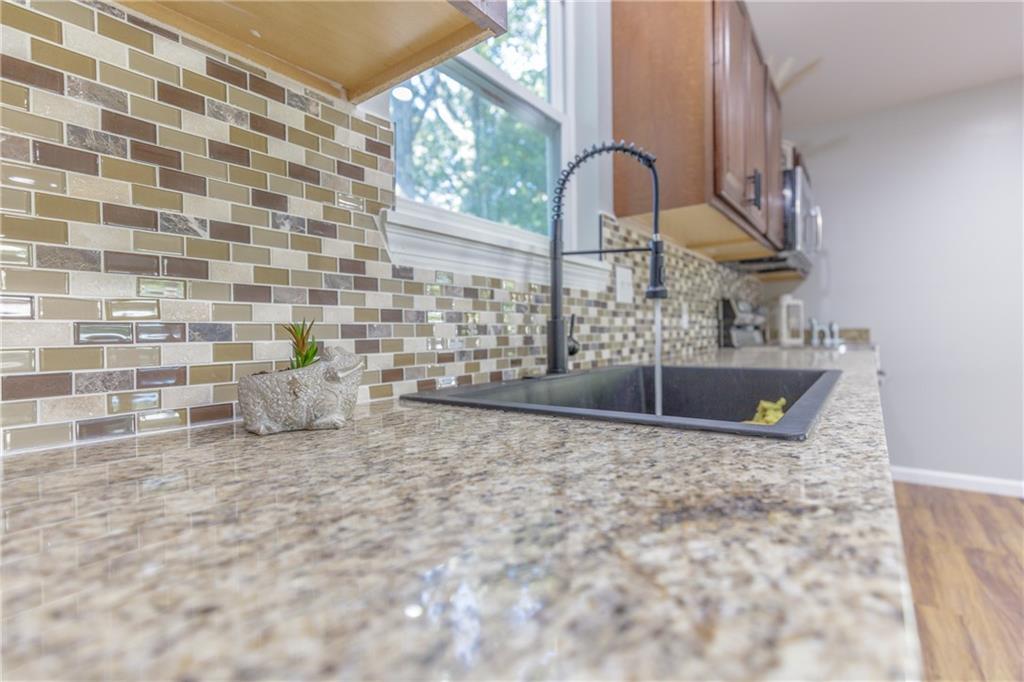 55 Reece Street Menlo, GA 30731 - Photo 11 of 46 a bathroom with a sink and a mirror